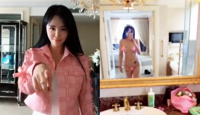 สาวคนสวยเขย่านมจับตาคนดู