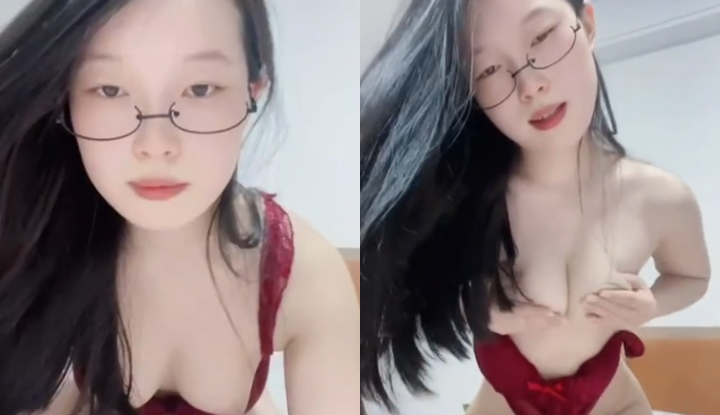 the bespectacled young woman rubbed her large, white breasts and used lewd language to seduce him.