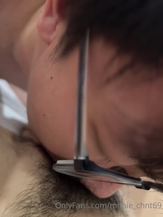 A young man with glasses is very good at licking pussy.