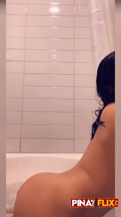 My girlfriend is being naughty and TikToking in the bathtub.