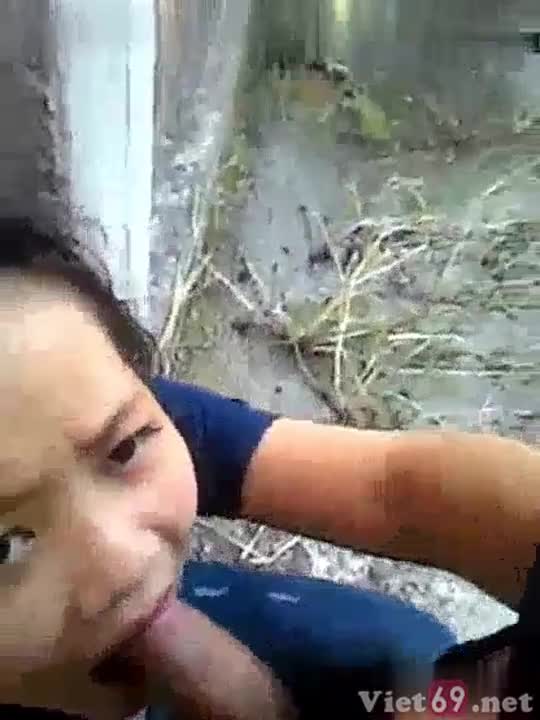 My lover sucks dick in the backyard behind the house