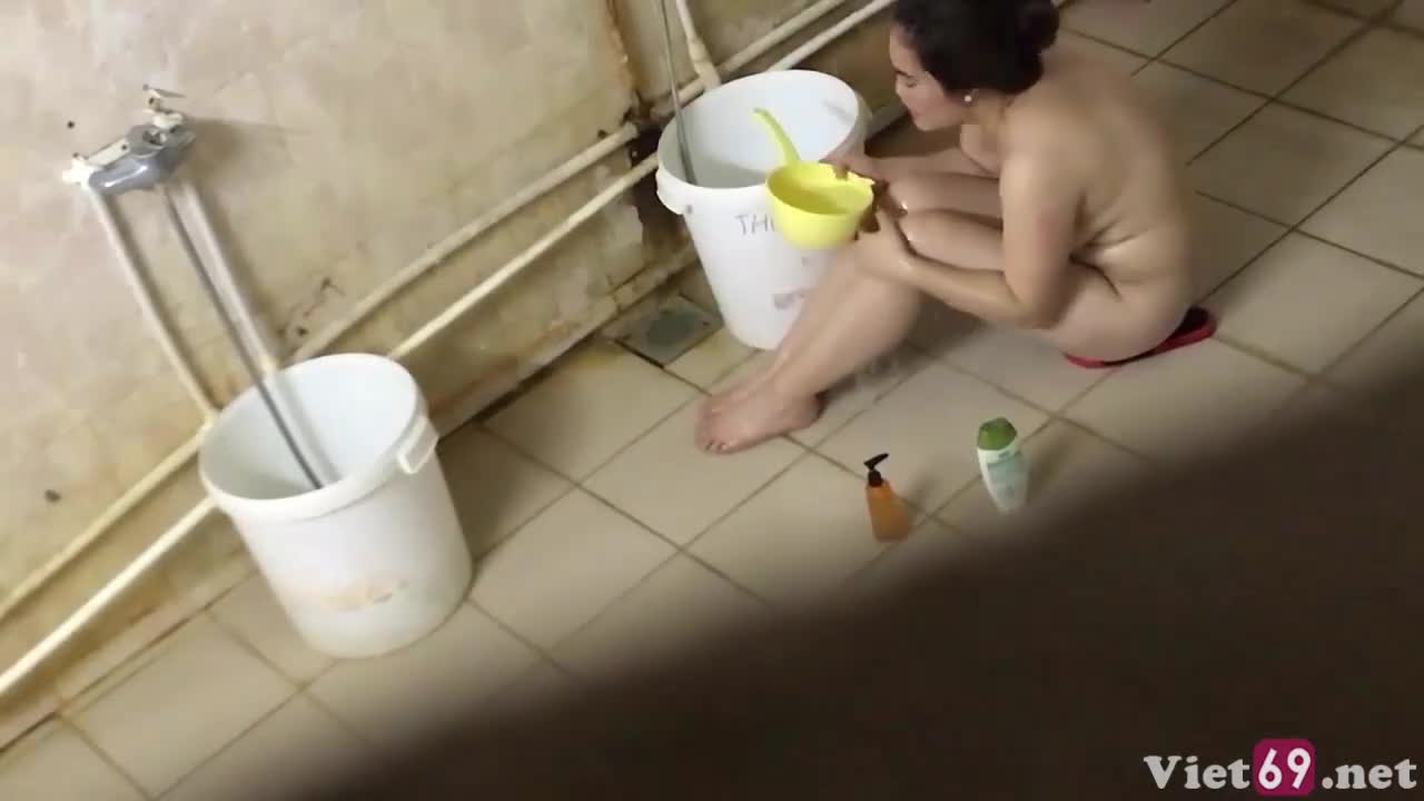 Spy on big-breasted sister bathing