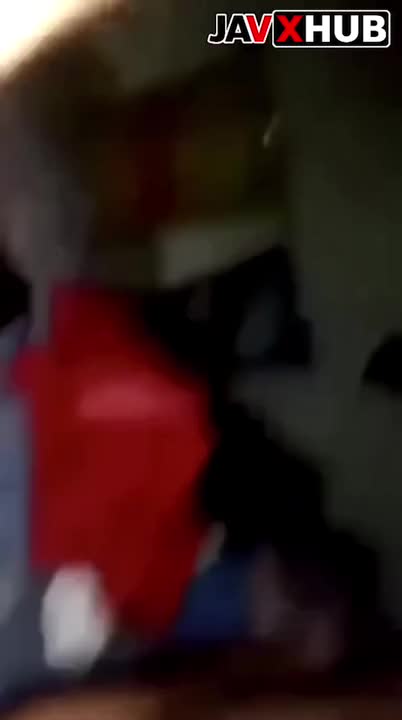 Home-made porn clip of a cute girl giving a handjob to her horny boyfriend before bed, she kisses his penis on the tip.
