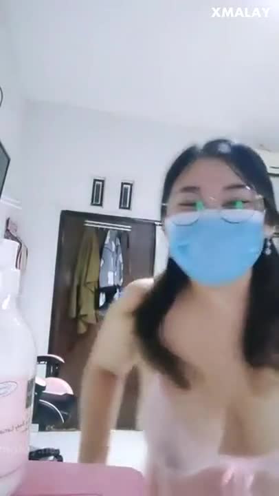 Having sex with my pretty girlfriend.