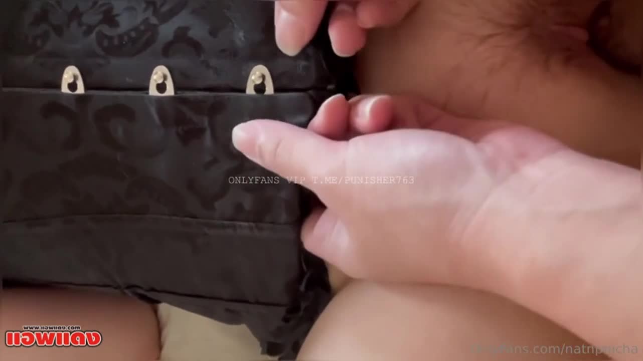 Natnpanicha grabbed her boyfriend's penis, stroked it until it was hard, and then vigorously masturbated him. Before inserting it into her wet vagina, she sucked on his erect nipples and then let him penetrate her until they both reached climax.